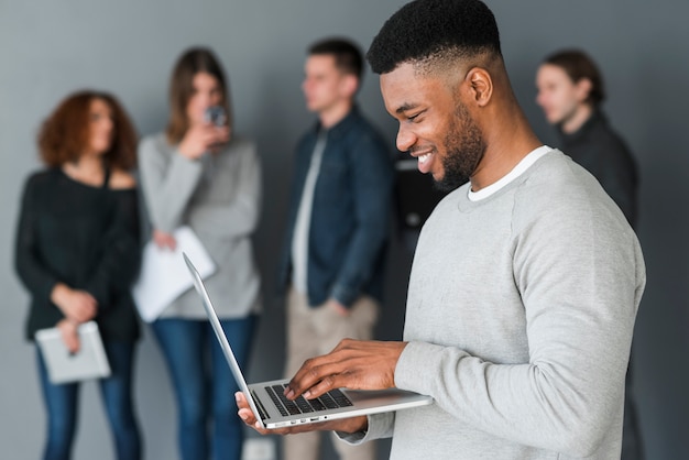 Group of people with laptops