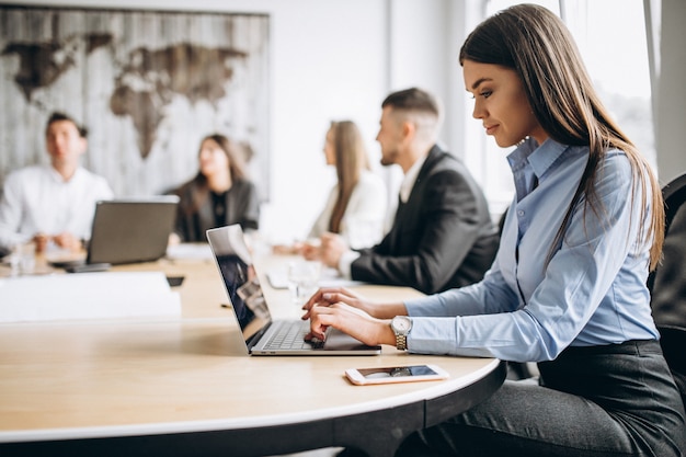 Group of people working out business plan in an office