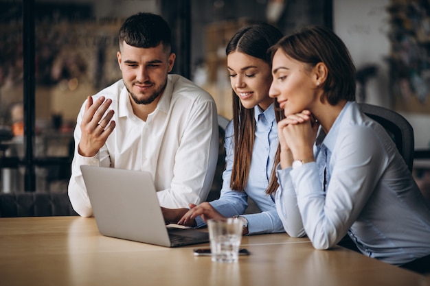 Group of people working out business plan in an office