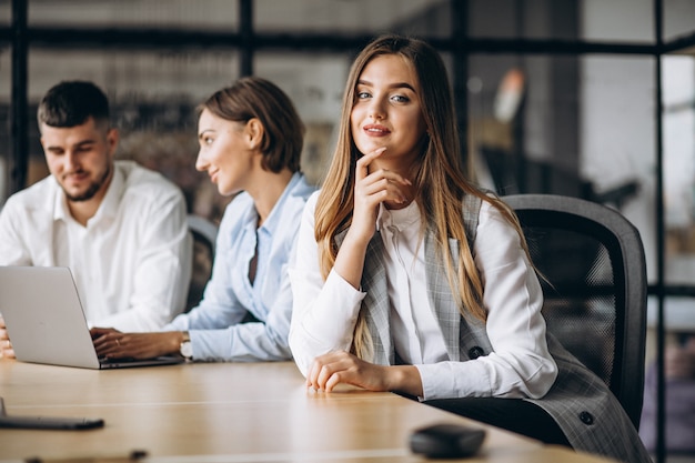 Group of people working out business plan in an office