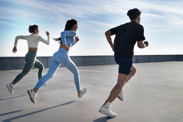 Group of people working out together outdoors