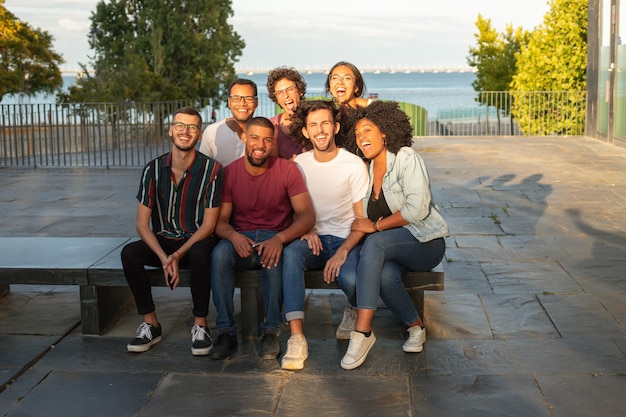 Group portrait of cheerful happy multiethnic men and women