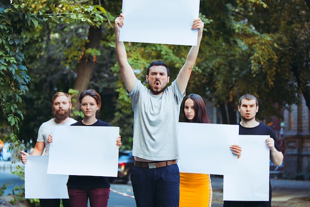 Group of protesting young people outdoors