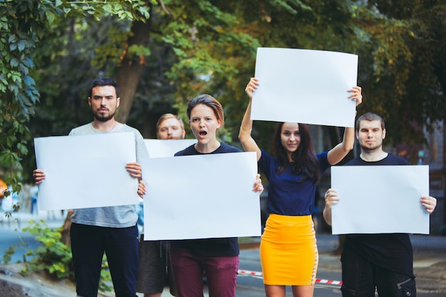 Group of protesting young people outdoors