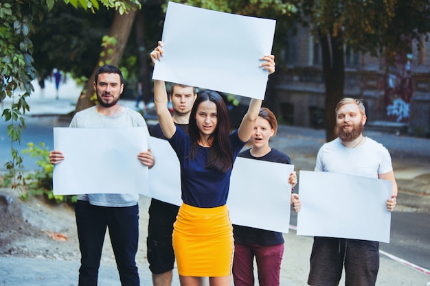 Group of protesting young people outdoors