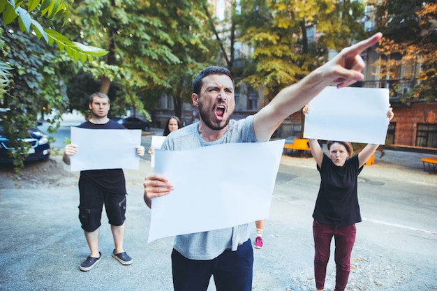 Group of protesting young people outdoors