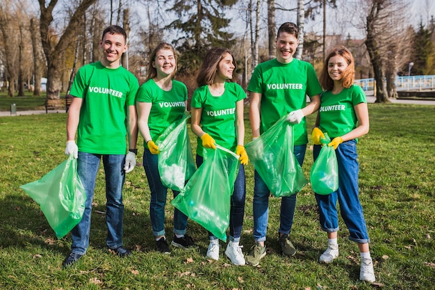 Free photo group of volunteers in nature