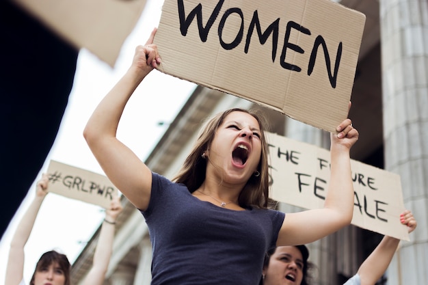 Free photo group of women marching for equal rights