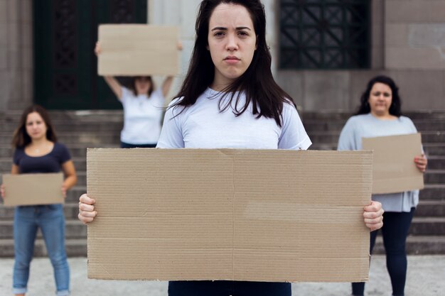 Group of women marching together for rights