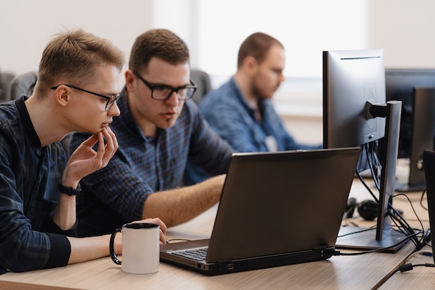 Group of young business people working in the office