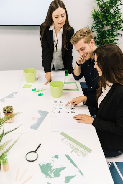 Free Photo group of young businesspeople having conversation on natural resources preservation