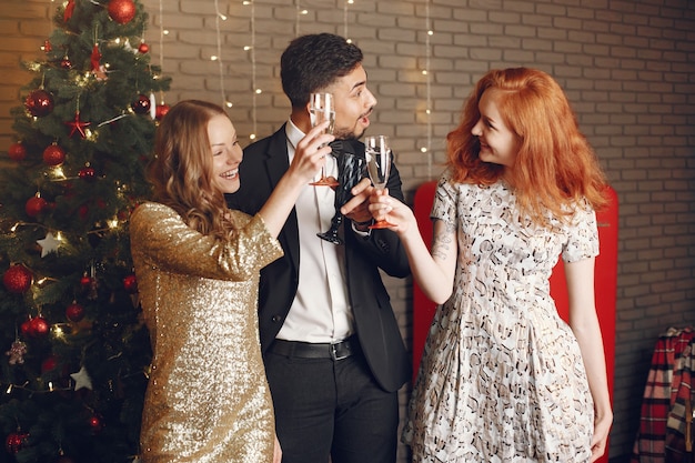 Free photo group of young people celebrating new year. women with indian man.