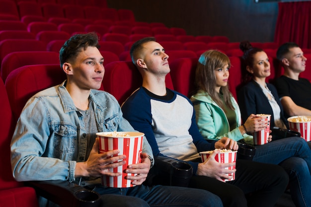 Group of young people in cinema