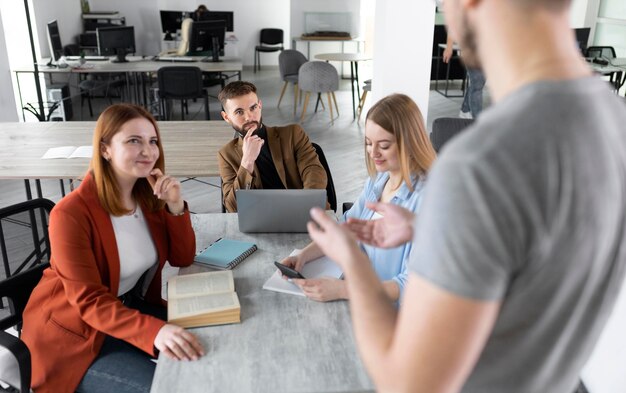 Group of young people at work