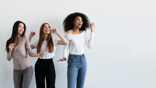 Free photo group of young women happy together