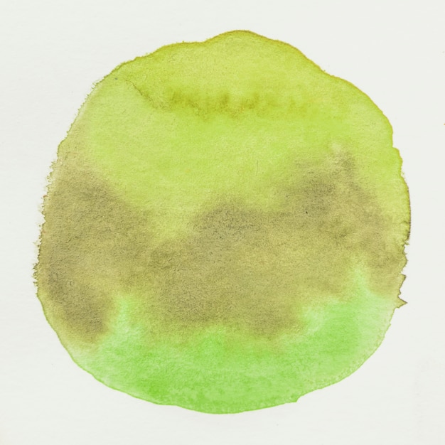 Grunge green watercolor stain spot on white canvas background