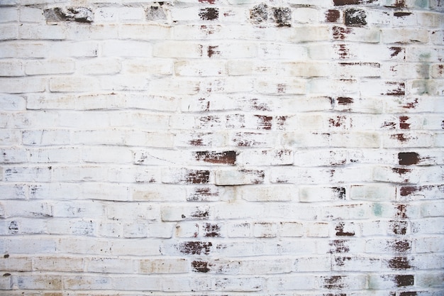 Free photo grungy weathered brick wall