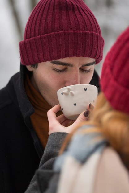 Guy sipping from a cup of tea