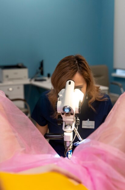 Gynecologist performing consultation on patient