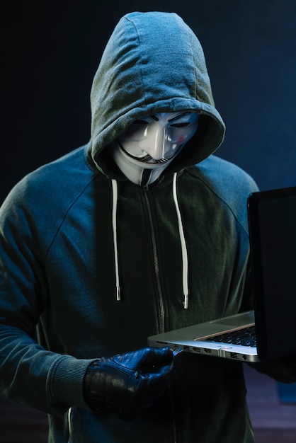 Free photo hacker with anonymous mask