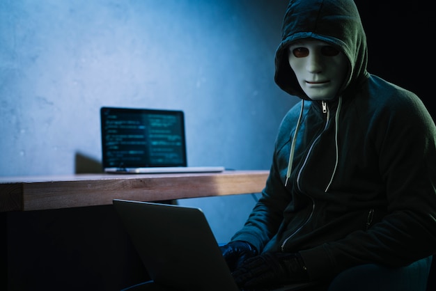 Hacker with laptop