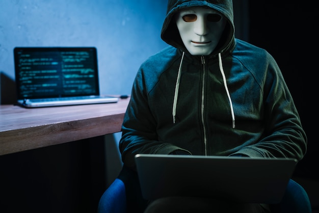 Hacker with laptop