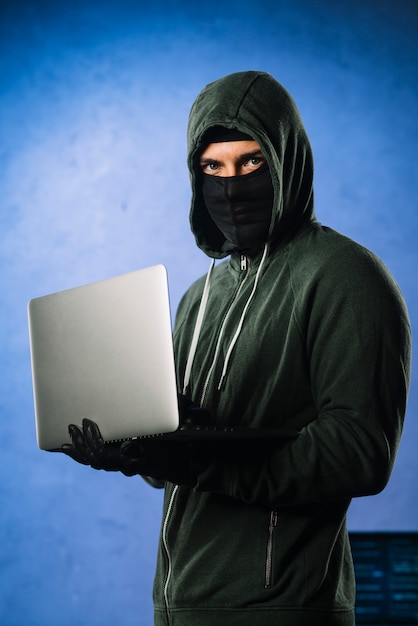 Hacker with laptop