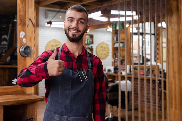 Haidresser showing thumb up sign