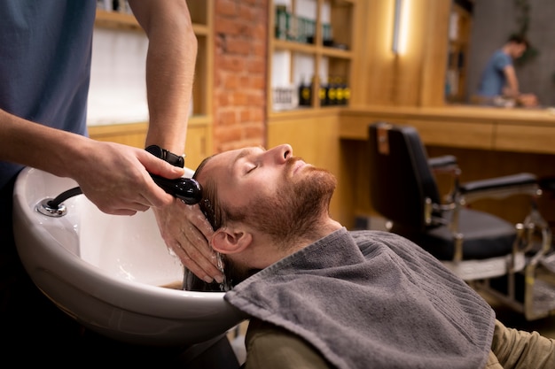 Hairdresser grooming their client