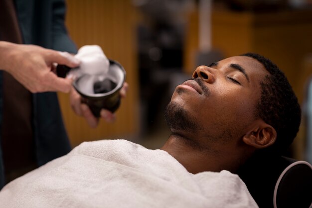 Hairdresser grooming their client