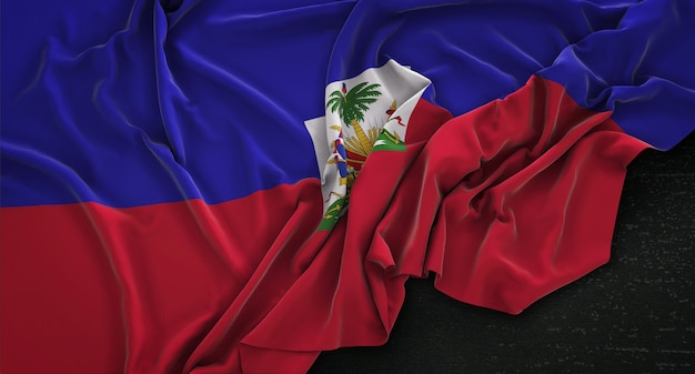 Free photo haiti flag wrinkled on dark background 3d render