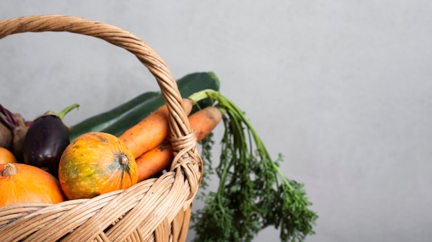 Half of a basket full with vegetables