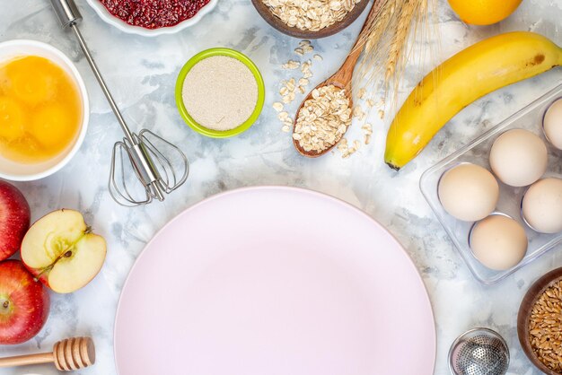 Half shot of white plate and fresh healthy food set on two-toned background