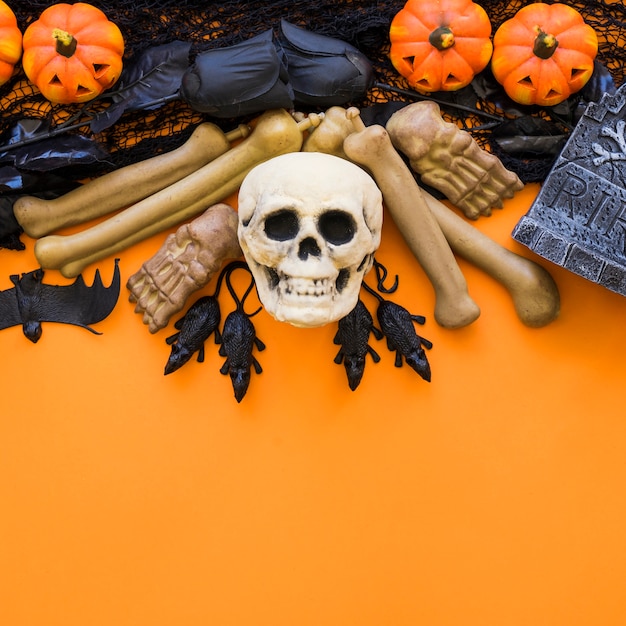 Free Photo halloween background with skull and bones