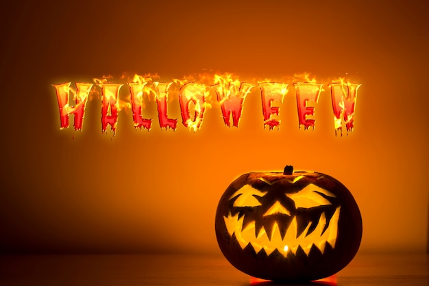 Free photo halloween banner with carved pumpkin