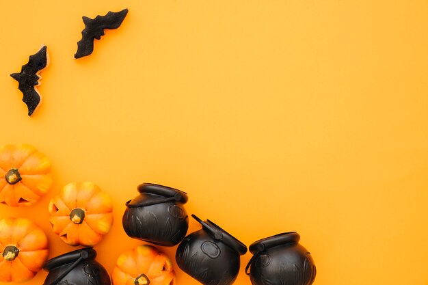 Halloween composition with tea pots