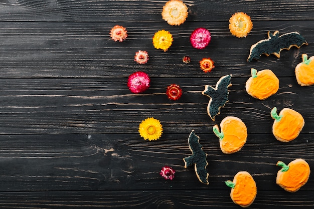 Free photo halloween cookies with flowers