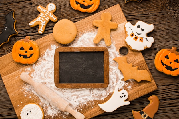 Halloween cookies on a wooden board