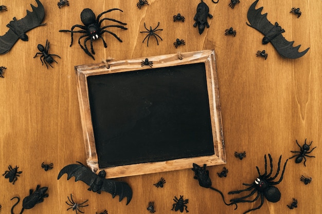 Free Photo halloween decoration with blank slate