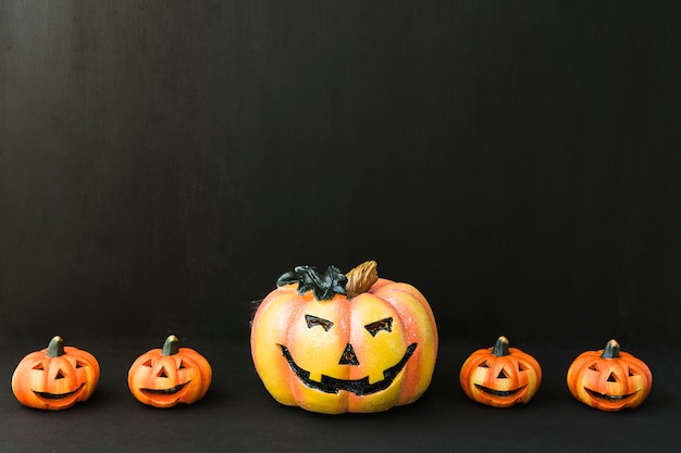 Halloween decoration with five pumpkins