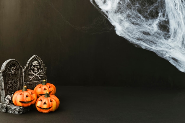 Free Photo halloween decoration with funny pumpkins