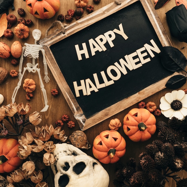 Free Photo halloween decoration with slate and letters