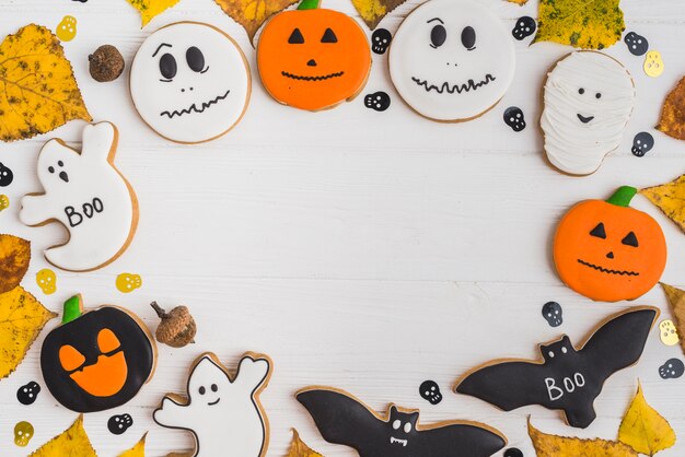 Halloween gingerbread, decorating skulls and foliage