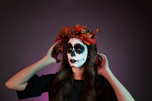 Halloween girl with wearing leaves wreath