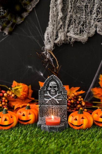 Free Photo halloween graveyard with friendly pumpkins