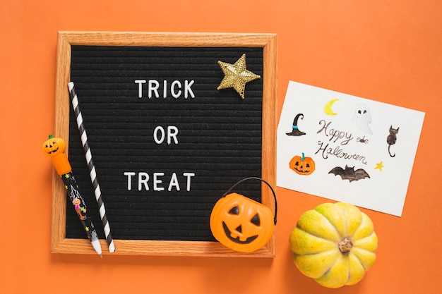 Free Photo halloween symbols and drawing near frame with writing