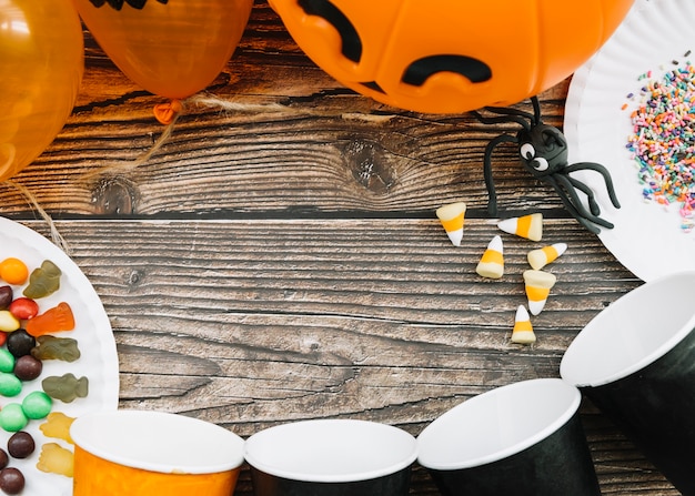 Free photo halloween table with balloons and spider