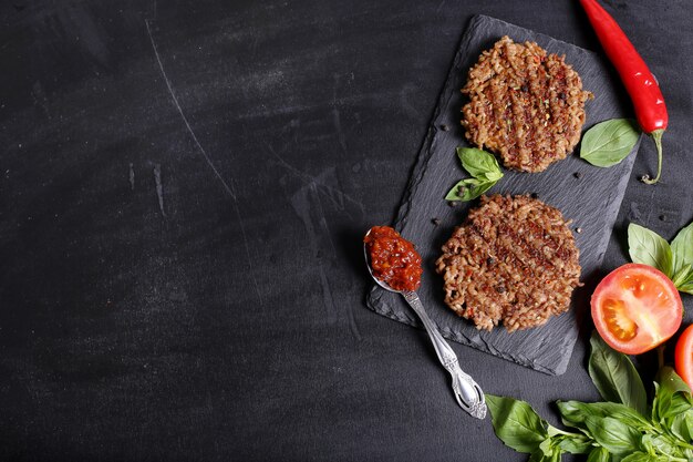 hamburger on wooden table background