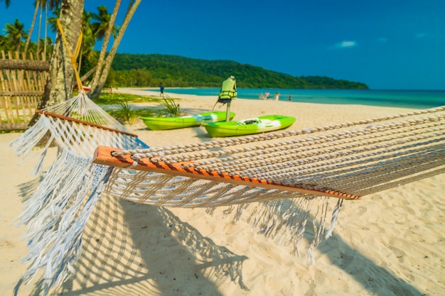 Free photo hammock  with beautiful nature tropical beach