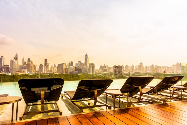 Free Photo hammocks with a city background